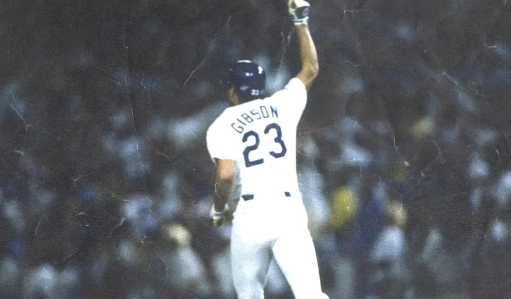 Kirk Gibson of the Dodgers pumps his fist rounding the bases in the 1988 World Series.