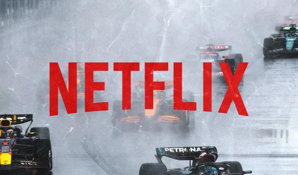 The Netflix logo over a rain-soaked Formula 1 race start.